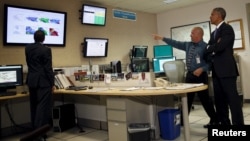 President Barack Obama visits the National Hurricane Center in Miami, May 28, 2015.