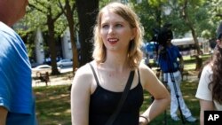 FILE - Chelsea Manning attends a rally in support of the J20 defendants, May 11, 2018, in Washington.
