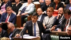 British Prime Minister Rishi Sunak speaks during Prime Minister's Questions at the House of Commons in London on May 8, 2024. Sunak's party suffered a blow as another Conservative lawmaker moved to the Labour Party. (U.K. Parliament via REUTERS