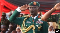 FILE - Nigerian army chief Lieutenant General Taoreed Lagbaja salutes during a funeral ceremony for officers in Abuja, Nigeria, on March 27, 2024. Nigerian President Bola Tinubu announced Lagbaja's death on Nov. 6, 2024.