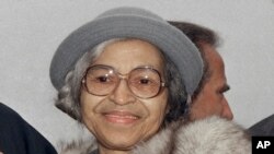 FILE - This Oct. 28, 1986, photo shows Rosa Parks at Ellis Island in New York. 