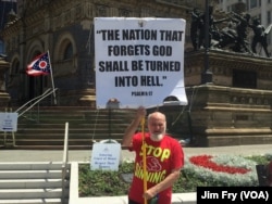 Willard Manning of West Monroe, Louisiana, calls himself "God's prophet," in the Public Square in downtown Cleveland, July 18, 2016. The Republican National Convention, being held a few blocks away in the Quicken Loans Arena, began Monday.