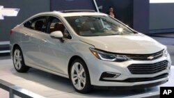 FILE - A Chevrolet Cruze is on display at the Pittsburgh International Auto Show in Pittsburgh, Pennsylvania, Feb. 11, 2016. General Motors, maker of the Cruze model, says consumer demand for the car in the U.S. has forced it to ramp up production in its plant in Ramos Arizpe, Mexico.