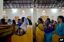 Catholics participate in Holy Mass at St. Joseph's church in Thannamunai, Sri Lanka, April 30, 2019.