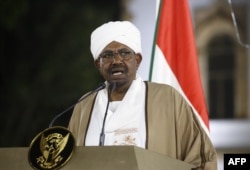 Former Sudanese President Omar al-Bashir delivers a speech to the nation, Feb. 22, 2019, at the presidential palace in the capital Khartoum.