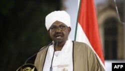 FILE - Sudanese President Omar al-Bashir delivers a speech to the nation, Feb. 22, 2019, at the presidential palace in the capital Khartoum.