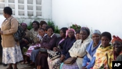 Women in Kapenguria, Kenya, wait to be screened during a 'Prevention International: No Cervical Cancer' training campaign.