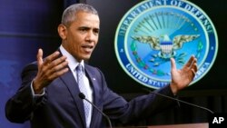 FILE - President Barack Obama speaks during a news conference at the Pentagon in Washington, Aug. 4, 2016. Obama cut short the sentences of 111 federal inmates Tuesday.