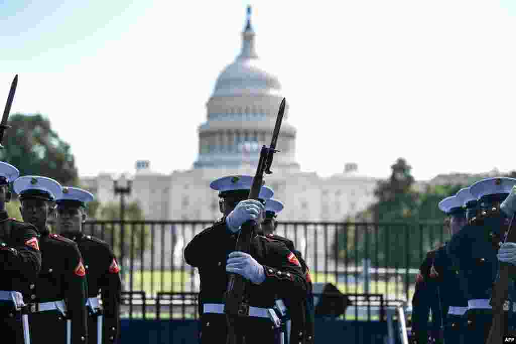 Members of a US Marines silent drill team gather before the start of the IndyCar Freedom 250 Grand Prix in Washington, DC, on August 23, 2026.