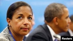 FILE - U.S. National Security Advisor Susan Rice is seen with President Barack Obama in the background.