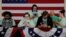 Supporters of Democratic 2020 U.S. presidential candidate and U.S. Senator Elizabeth Warren (D-MA) look at their mobile phones before she speaks at her Iowa Caucus rally in Des Moines, Iowa, U.S., February 3, 2020. Picture taken February 3, 2020. REUTERS…