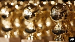 In this Jan. 6, 2009, file photo, Golden Globe statuettes are seen during a news conference at the Beverly Hilton Hotel in Beverly Hills, California. 