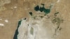 This picture from 2015 shows how the Aral Sea in Central Asia has shrunken in size dramatically as demand for water grows. (Credit: NASA Earth Observatory)