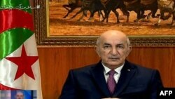 A video grab from Algeria 3 public channel shows Algerian President Abdelmadjid Tebboune giving a televised speech on Feb. 18, 2021 in Algiers.