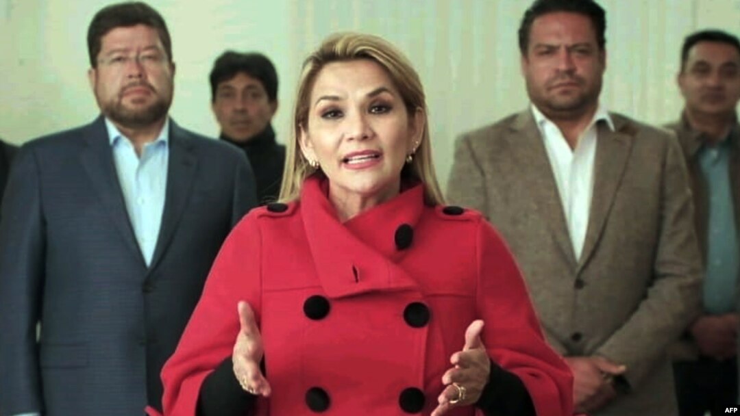 This picture released by the Bolivian government shows the interim president of Bolivia, Jeanine Anez, announcing her withdrawal from the presidential race a month before the elections in La Paz, Bolivia, on Sept. 17, 2020. 