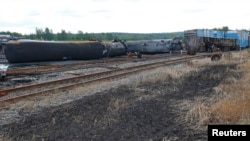 Wagons of the train wreck are seen in Lac Megantic, July 9, 2013. 