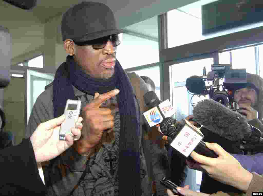 Former NBA star Dennis Rodman speaks to media just before he leaves Pyongyang March 1, 2013 in this picture released by North Korea's KCNA news agency. KCNA reported that a mixed basketball game of visiting American basketball players and North Korean pla