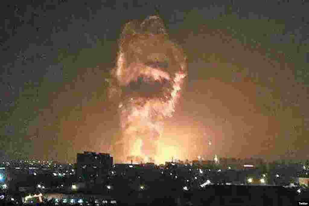A social media image shows flames and smoke from an explosion rising into the night sky in Tianjin, Aug. 13, 2015.