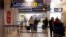 Travelers exit the coronavirus testing area at Ben Gurion International Airport as Israel imposes new restrictions near Tel Aviv, Israel, Nov. 28, 2021. 