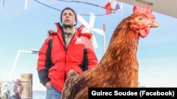 Guirec Soudee and his hen Monique are sailing around the world together