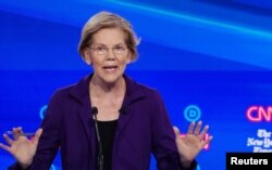 FILE - Senator Elizabeth Warren speaks during the fourth U.S. Democratic presidential candidates 2020 election debate in Westerville, Ohio, Oct. 15, 2019.