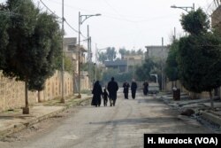 In areas like this one near the Tigris River, mortars and sniper fire still fall, so most residents have either fled the neighborhood or remain indoors, Feb. 12, 2017, in Mosul, Iraq.