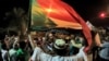 FILE - Demonstrators gather outside the army headquarters in Sudan's capital Khartoum on May 11, 2021, on the hijri-date anniversary of the killing of Sudanese protesters during a raid on an anti-government sit-in in 2019.