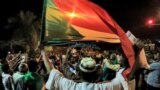 FILE - Demonstrators gather outside the army headquarters in Sudan's capital Khartoum on May 11, 2021, on the hijri-date anniversary of the killing of Sudanese protesters during a raid on an anti-government sit-in in 2019.