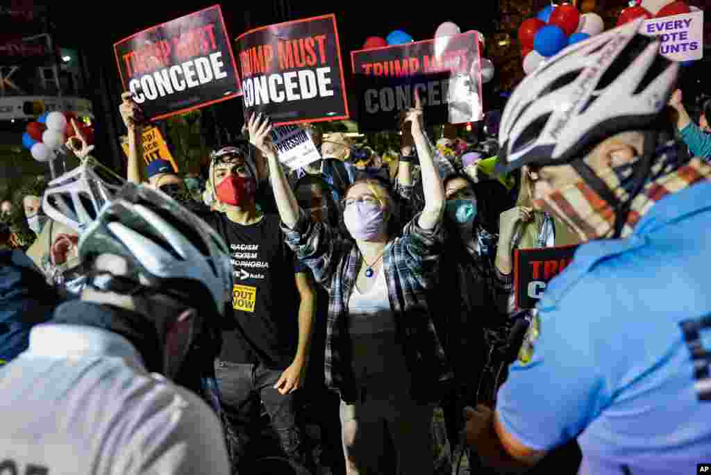 Demonstrators demanding President Donald Trump concede chant three days after the presidential election polls closed, in Philadelphia, Pensylvania, Nov. 6, 2020.