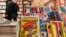 The first issues of the German version of French satirical weekly Charlie Hebdo are for sale at a newsstand in Berlin, Dec. 1, 2016. 