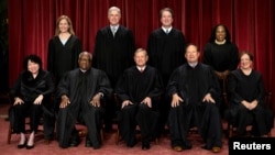 FILE - U.S. Supreme Court justices pose for their group portrait at the Supreme Court in Washington on Oct. 7, 2022.