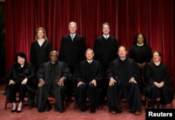 FILE - U.S. Supreme Court justices pose for their group portrait at the Supreme Court in Washington on Oct. 7, 2022.