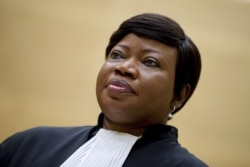 FILE - Prosecutor Fatou Bensouda is pictured in the courtroom of the International Criminal Court at The Hague, Netherlands, Sept. 29, 2015.