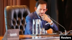 FILE - Brunei's Sultan Hassanal Bolkiah attends a retreat session during the APEC Summit in Port Moresby, Papua New Guinea, Nov. 18, 2018.