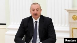 Presiden Azerbaijan President Ilham Aliyev dalam sebuah kesempatan pada Januari 2021. (Foto: Sputnik/Mikhail Klimentyev/Kremlin via Reuters)