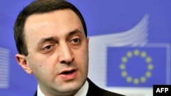 FILE - Georgia's Prime Minister Irakli Garibashvili speaks during a press conference at EU headquarters in Brussels, Feb. 3, 2014. 