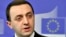 FILE - Georgia's Prime Minister Irakli Garibashvili speaks during a press conference at EU headquarters in Brussels, Feb. 3, 2014. 