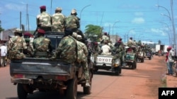 Central African troops in charge of disarmament drive through Bangui, Central African Republic, Sept. 5, 2013.