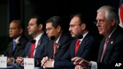 Secretary of State Rex Tillerson, right, gestures as he speaks during the Conference on Prosperity and Security in Central America, June 15, 2017, in Miami. Tillerson was joined by Mexican Foreign Secretary Luis Videgaray, second from left; Honduran President Juan Orlando Hernandez, center; Guatemalan President Jimmy Morales, second from left; and El Salvadoran Vice President Oscar Ortiz.