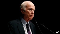 FILE - Sen. John McCain, R-Ariz., delivers remarks at the U.S. Naval Academy in Annapolis, Maryland, Oct. 30, 2017. 