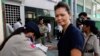 (File Photo) Cambodian opposition lawmaker Mu Sochua goes through a security check at Phnom Penh Municipal Court, Sept. 8, 2010. 