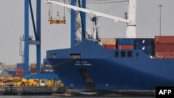 The cargo ship Bahri Yanbu is seen moored at Tilbury Docks at the Port of Tilbury in Essex as seen from the village of Swanscombe in Kent, east of London, May 7, 2019. 