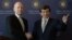 British Foreign Secretary William Hague, left, and his Turkish counterpart Ahmet Davutoglu shake hands after a news conference in Istanbul, Turkey, Nov. 20, 2013.