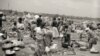 Abidjan residents live and work near the dump site, February 2009. (Greenpeace)