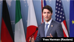 El primer ministro de Canadá, Justin Trudeau, ofrece una conferencia de prensa al final de la cumbre del Grupo de los Siete en La Malbaie, Quebec. Junio 9, 2018. REUTERS/Yves Herman