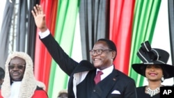 FILE - Malawi's President Lazarus Chakwera greets supporters after being sworn in in Lilongwe, Malawi, June 28 2020.