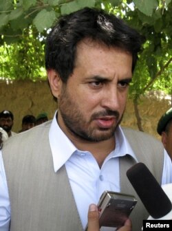 Afghanistan's Intelligence Chief Asadullah Khalid speaks to the media in the Arghandab district of Kandahar province, June 20, 2008.