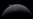 FILE PHOTO: A view of Earth, partially hidden by the Moon, photographed through the Orion spacecraft window