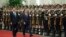 South Korean President Moon Jae-in, center right, and Chinese President Xi Jinping review the Chinese honor guard during a welcoming ceremony at the Great Hall of the People in Beijing, Dec. 14, 2017.