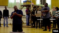 Otto Maidi, who plays Porgy in the Cape Town Opera Company's production of Porgy and Bess, sings a solo during rehearsals in June, Cape Town, South Africa. (Peter Cox/VOA)
